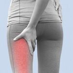 Patient receiving chiropractic care for leg pain
